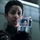 Naomi (Dominique Tipper) sees a picture of her son.